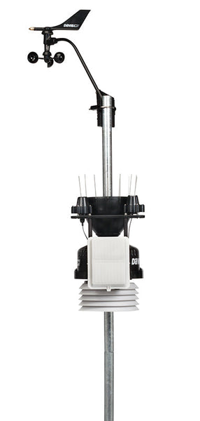 Cabled weather station by Davis Instruments with wind vane, rain collector, and temperature sensor mounted on a metal pole.
