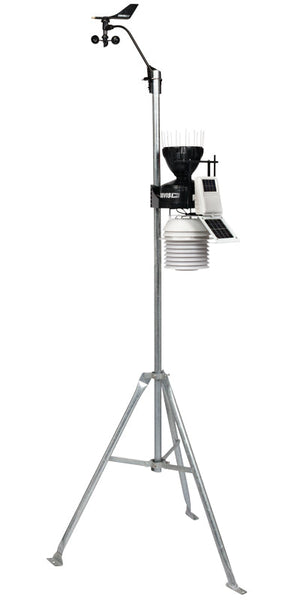 Wireless weather station with fan-aspirated radiation shield by Davis Instruments on a tall, silver tripod.